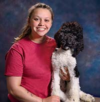 Gabriella Graham Gabriella Graham with a black and white dog